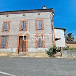 Maison de village à rénover avec jardinet et garage non attenant