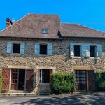 Stone house and barn in a quiet hamlet setting