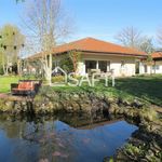 Belle villa d'architecte avec jardin paysagé au calme à la campagne.