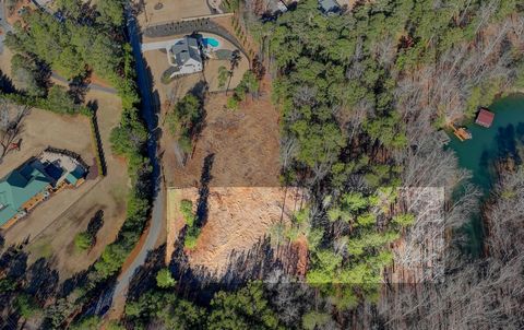 Come build your dream lake home on quiet cove and private street. Walking distance to Aqualand Marina in desirable Flowery Branch. Level lot to gentle slope to the water. Lake front views in wake free cove. Close to main channel of Lake Lanier. No HO...