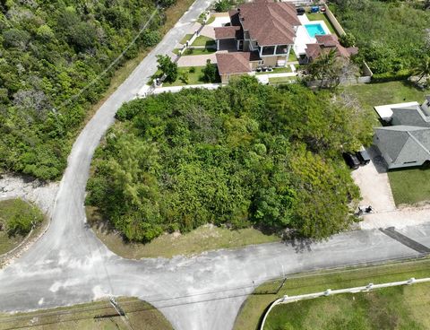 Lot #25A Country Club Estates is a large corner lot that is located in the South Ocean area and is perfect to build your family home. This location is close to the beach, Albany, Mahogany house, Island house, and much more.