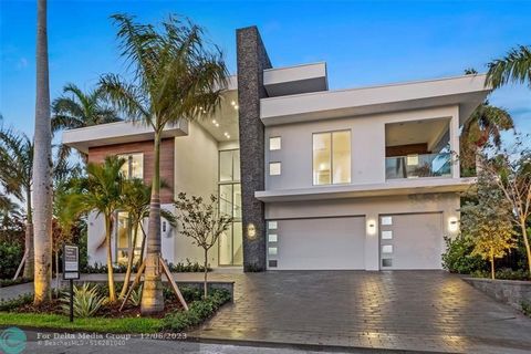 Defined by clean lines and a bright open ambience with walls of glass offering water views, this chic new-construction six-bedroom Las Olas Isles residence, with 6,140 square feet, encapsulates a sophisticated elegance for a ‘Now’ style of living. Dr...