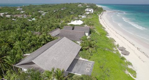 Located on Harbour Island, just off the northern tip of the Bahamas' larger Eleuthera Island, the two-story residence perches atop a sand bank, giving it the name House on a Dune, and is designed to make the most of views of the surrounding North Atl...