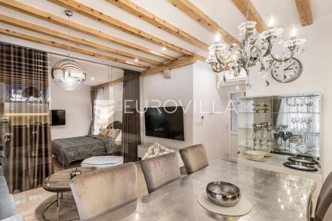 Trogir, an exclusive opportunity for long-term rental in the old town. Beautifully decorated studio apartment with wine cellar. It consists of an entrance hall, a bathroom, a kitchen with a dining room, a living room, a bedroom separated by a glass w...