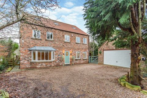 Guide Price £775,000 - £800,000 Step into the epitome of refined living with this executive detached family home, boasting an impressive 2906. sq ft spread across three floors. This luxurious residence offers five generously proportioned double bedro...
