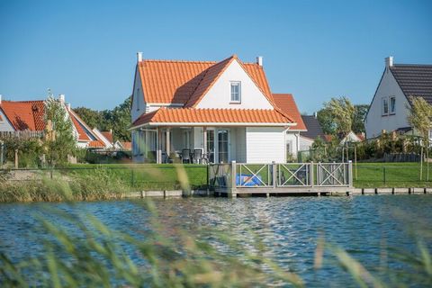 This restyled villa, which is detached and located on the water, can be found at the Noordzee Résidence Cadzand-Bad holiday park. It is just 400 m away from the beach of the North Sea and a mere 13 km from the renowned and charming Belgian seaside re...