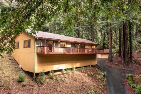 Beautifully updated mountain home, nestled in a peaceful valley with serene redwood views. Spacious remodeled kitchen with all new cabinetry, granite countertops, and stainless steel appliances, breakfast dining area and office nook. Formal dining an...