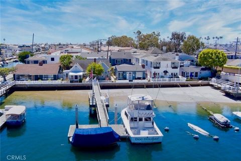 Seize this unique Balboa Island opportunity to own or develop this oversized Bayfront property, featuring 45 feet of pristine waterfront. This rare one and one-half lot offers unparalleled potential to build your dream estate-sized home of over 4,000...