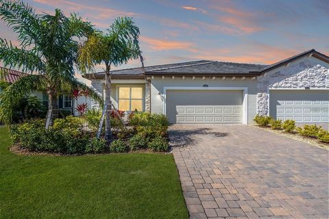 PRICE IMPROVEMENT!!! LOCATION, LOCATION, LOCATION!!! Nestled in the heart of LAKEWOOD RANCH, this Jasmine floor-plan is one of the LARGEST villas available in the area, offering almost 2,000 Sq. Ft. of living space! MAINTENANCE FREE, GATED, partial W...