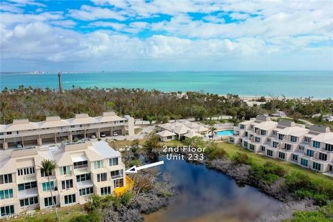 Nestled on the east end of Sanibel Island, this beautifully remodeled end-unit condo offers a seamless blend of style and comfort. With handcrafted solid teak cabinetry and exotic Level 5 Blue Luiscountertops, the kitchen mimics the elegance of a fin...