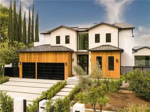 Stunning, gated new construction tucked away on a quiet cul-de-sac in prime South of Boulevard Tarzana. This immaculately finished estate showcases stunning views from nearly every room. Featuring 6 bedrooms, 8 bathrooms and 7,500 square feet of unpa...