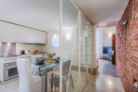A charming second-floor apartment in a historic Lucca palace, this tastefully restored holiday home offers two bedrooms and accommodates up to three guests. The layout includes a mezzanine with a double bed and a second bedroom with a single bed and ...
