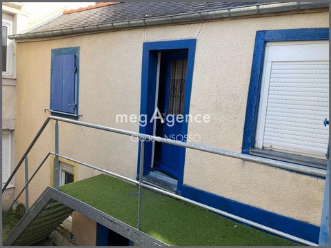 Investissement Stratégique: Maison fonctionnelle avec potentiel d'agrandissement.