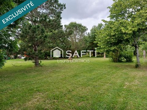 Superbe terrain à bâtir arboré et plat à DREMIL-LAFAGE