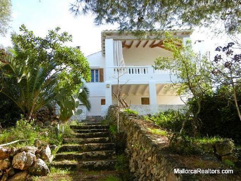 Menorca style country house only a few metres from the beach of Santandria. The property, which dates from the XVIII or XIX century, is made up of three independent dwellings: two independent floors in the main house plus a studio flat, which was ori...