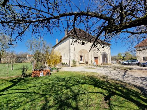 REF 18536 AA - EXCLUSIVE - At the gates of SAINT-VIT - Housed on flat land of 1700 m², this old stone farmhouse is classified as a French monument. On one level: Living room of 70 m², two bedrooms, an independent studio, bathroom and toilet. Numerous...