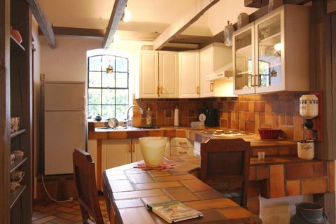 The old millstone now serves as a living room table - and everything else in this holiday home is very special. After all, you live here in a historic grain mill from the 18th century. The lovingly restored mill with adjoining storage offers you a li...