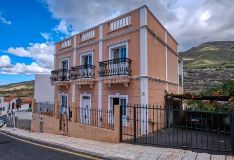 This is a very large house located in the village of Adeje and is built over three levels. It is in a very quiet part of the village and has its own parking area for various cars and has views to the mountains and partial sea views. It is very spacio...