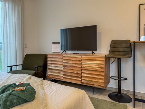 Welcome to dicostays & this luxurious studio apartment that offers you everything you need for a great short or long-term stay in Stuttgart-Plieningen: → comfortable double bed → NESPRESSO coffee → Kitchen → Washing machine → Parking spaces → Bus sto...