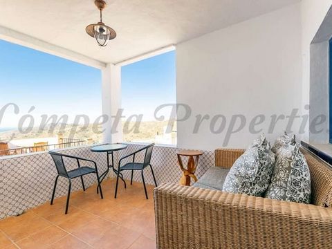 Wonderful bright & airy townhouse with amazing coastal views set in the mountain village of Cómpeta. The property offers two floors and a large roof terrace. On the ground floor one will find the living area and a double bedroom, following a flight o...