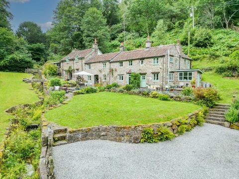 This charming detached four-bedroom stone cottage, nestled into the hillside in the pretty Wye Valley village of Penallt, sits in a 2.75 acre plot which includes various well landscaped picture book gardens divided by a stone lined brook with stone b...