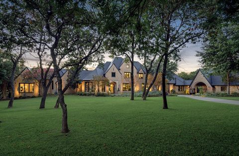 Nestled within the prestigious, gated community of The Landing on Lake Grapevine, this luxury estate epitomizes opulent lakeside living. This meticulously renovated property, which underwent a $5.5 million transformation, spans across a two-acre lot ...