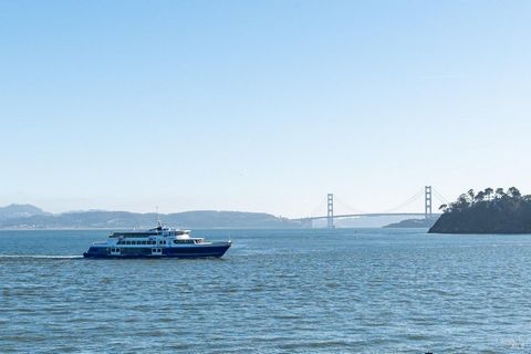 Discover coastal elegance at 403 Paradise Drive, a luxurious 3 bedroom, 2 bath upper townhome in Point Tiburon Bayside. Enjoy breathtaking views of San Francisco Bay, the Golden Gate Bridge, and city lights. This home features a spacious living and d...