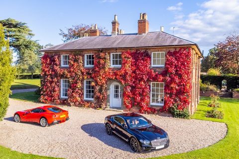 Ground Floor The front of the property faces to the west and showcases a semi-circular off-center doorway with raised molded impost blocks and double glazed panelled front doors. This grand entrance opens into a spectacular hallway which boasts an or...