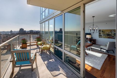 Experience luxury living at the Solaria Condominium. This is the most unique and largest two-bedroom, two-and-a-half-bathroom condo in the building, featuring a 58-foot by 7.5-foot terrace. Flooded with light from east and south exposures, maximized ...