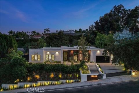 Tucked away in the hills of Encino, this newly constructed single-story estate sits on a sprawling 18,000+ sf gated lot. Designed with an earthy, organic aesthetic and assembled using the highest quality materials and finishes, this luxurious home sh...