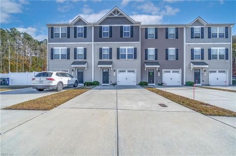 This beautiful modern townhome located in central Suffolk is a must see! It is minutes away from Downtown Suffolk, the interstate, Route 58, shopping, & fine dining. The first-floor level hosts a plethora of storage space, one-car garage, & an unfini...