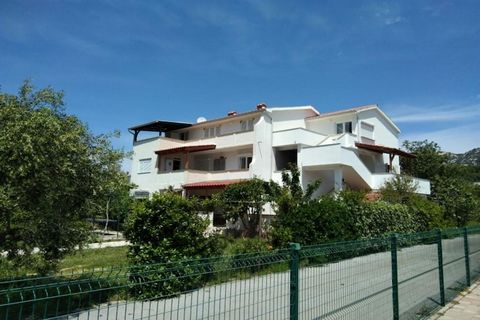 Apartments Verović Rab Banjol is a well-appointed, family- or group‑friendly holiday home in scenic Banjol, featuring spacious indoor living, multiple bedrooms/bathrooms, terrace dining, proximity to beaches, and locally celebrated hospitality. It is...