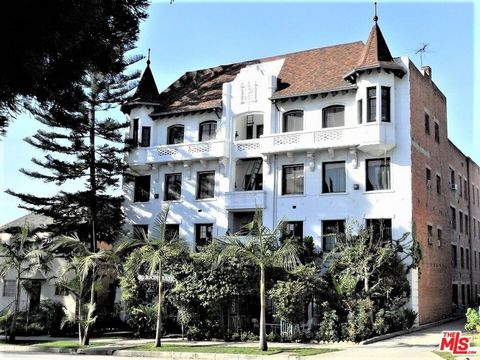 This exquisite 32-unit residential income property stands out with gorgeous French Normandy design and ornate, architectural details. Located along Vermont, just below the hills of Los Feliz, the Griffith Observatory and just blocks from Los Feliz Vi...