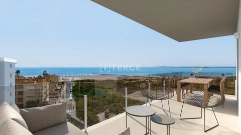 Apartamenty z widokiem na ocean w kompleksie w Santa Pola, Alicante. Apartamenty na sprzedaż w Santa Pola, Alicante oferują doskonałą lokalizację w pobliżu plaży. Są częścią kompleksu z basenem i ogrodami, zapewniając relaksującą atmosferę. ALC-00749...