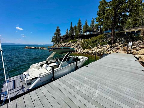 Amazing Marla Bay luxury lakefront estate perched on a secluded point offering incredible southwest and unobstructed views. This property has just completed an extensive renovation that includes the finest quality in style and finishes. Offering a mo...