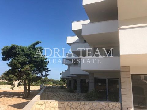 House for sale with gardens, new building - top location, Pag - Novalja. PROPERTY DESCRIPTION: AP1 (2 floors) - Ground floor: living room, kitchen, dining room, pantry / storage room, entrance hall, toilet, terrace; 1st floor: 2 bedrooms, bathroom, b...