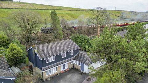 This 4 bedroom, executive detached family home offers generous living accommodation, a sought after setting, sun room, garage / workshop space, good gardens and a comparatively tucked-away position in the lovely surroundings of Irwell Vale - Viewing ...