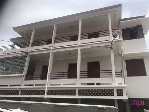 Great potential for this building to renovate in the center of Saint-Pierre. This property built on three levels, benefits from private parking spaces and a sea view. It is composed of: Ground floor 106.55m2: - Commercial premises (ex-pharmacy) with ...