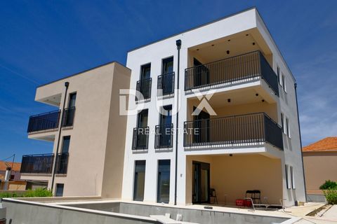 ZADAR, BIBINJE - Piękny apartament z widokiem na morze! Nowa konstrukcja! S6-C Przedstawiamy Państwu niepowtarzalną okazję zakupu mieszkania w ramach nowej inwestycji składającej się z trzech nowoczesnych budynków, położonych zaledwie 670 metrów od m...