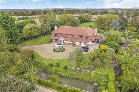 THE PROPERTY Upon entering, you are greeted by a bright, spacious entrance hall that immediately sets the tone for the luxurious accommodation that lies beyond. At the heart of the home is a vast, beautifully handcrafted kitchen and living area, wher...