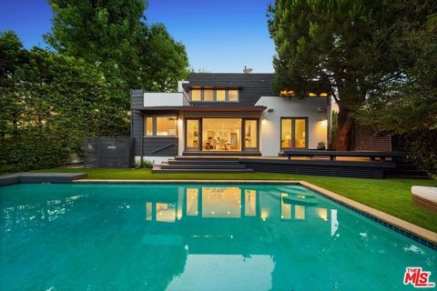 Secured by gates, this Brentwood gem offers contemporary living in the heart of the Westside. High-end finishes, hardwood flooring, and meticulous attention to detailevident in the angular windows, lighting, and overall flowmake this residence truly ...