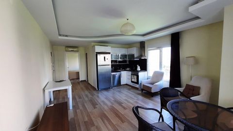 Zum Verkauf steht eine moderne Wohnung in einem Neubau in Alanya, nur 250 Meter vom Meer entfernt. Dieses stilvolle Apartment mit einem Schlafzimmer und offenem Grundriss bietet Komfort und Bequemlichkeit. Es ist komplett möbliert und mit allen notwe...