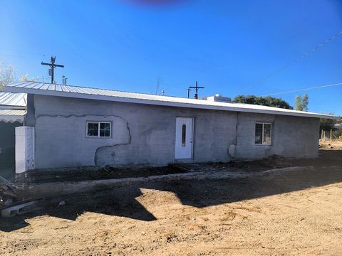 Discover the enchanting allure of this charming Chimayo, NM home, where breathtaking scenic views envelop your personal retreat. Spanning 1,600 square feet, this residence boasts beautiful wood floors that gleam in the abundant natural light, creatin...