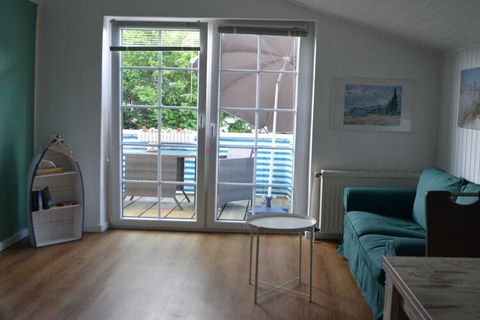 Modern ingericht vakantieappartement met keuken, badkamer en aparte slaapkamer en balkon op een goede locatie in Hooksiel.