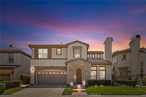Original homeowners, take pride of ownership on this impressive view home! This 4 bedroom, 3 bath home, located in the highly sought-after hillside community of Serrano Heights, features an open floor plan on a quiet cul-de-sac. Enter to find a lavis...