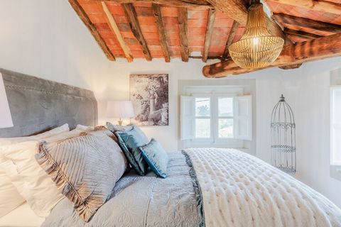 Welcome to charming villa retreat that embodies a traditional atmosphere reminiscent of days gone by. Start each morning with a refreshing swim in the private pool situated in front of the stone house, and unwind with a glass of wine on the four-post...