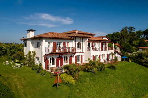 VILLA EGOA - Ideally located on the Basque Coast in the very busy little village of Guethary, house of about 400 m² to rent for holidays with a beautiful view of the mountains. This magnificent neo-Basque style building is located between Biarritz an...