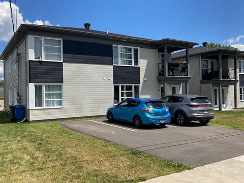 Quadruplex with modern style, 100% above ground, construction 2019, located in the heart of the village of Crabtree, peaceful and family area. Ideal location near major highways Highway 40, Route 158. Excellent rental income. Easy management. Close t...