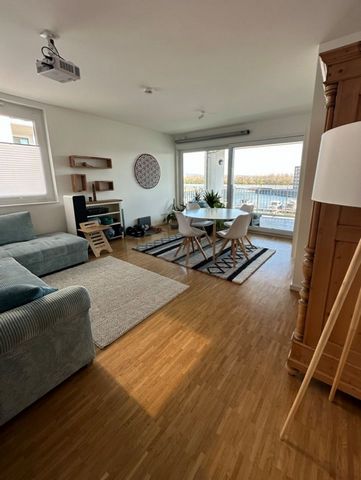 The apartment convinces with a high-quality real wood parquet and the open cut. A special highlight is the large terrace facing the marina. You can look over the entire harbor to far beyond the Rhine. The apartment is quiet and at the same time in th...