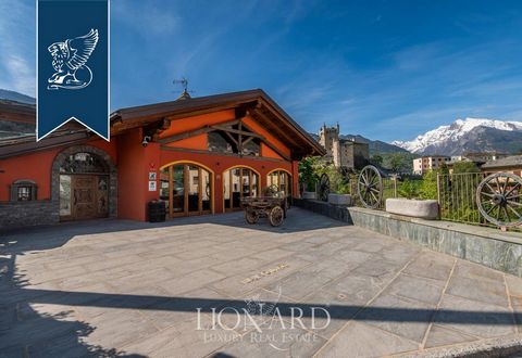 On the wonderful hill of Saint Pierre, in the heart of the Valle d'Aosta, surrounded by rows of vines and orchards, there is this stunning chalet featuring a hotel with a farm and an agritourism resort. Its strategic position near Aosta is conve...